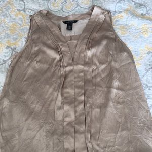 Gold sleeveless blouse